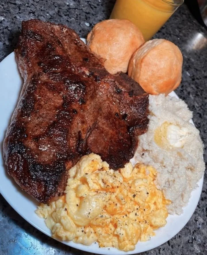 A delicious steak served as a breakfast dish with eggs and toast.