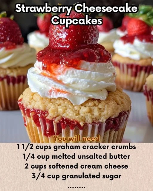 Strawberry cheesecake cupcakes topped with fresh strawberries and cream cheese frosting