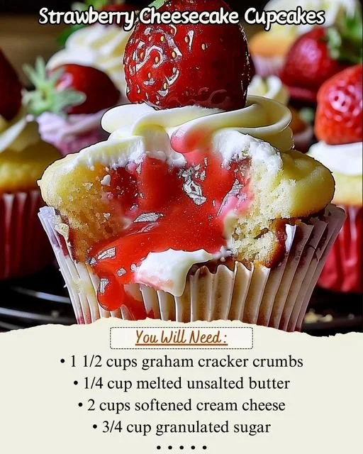 Strawberry cheesecake cupcakes decorated with fresh strawberries and cream