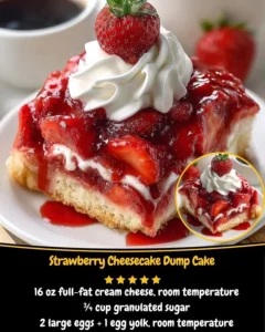 Delicious strawberry cheesecake dump cake served on a plate with fresh strawberries
