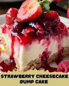 Delicious strawberry cheesecake dump cake topped with fresh strawberries and cream.