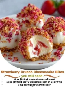 Strawberry crunch cheesecake bites served on a plate