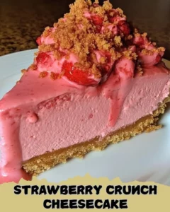 Slice of Strawberry Crunch Cheesecake with Strawberry Pink Cream Icing