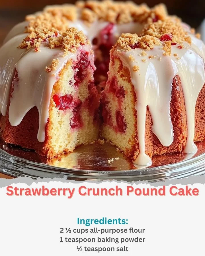 A slice of Strawberry Crunch Pound Cake topped with fresh strawberries and crunchy crumbs.