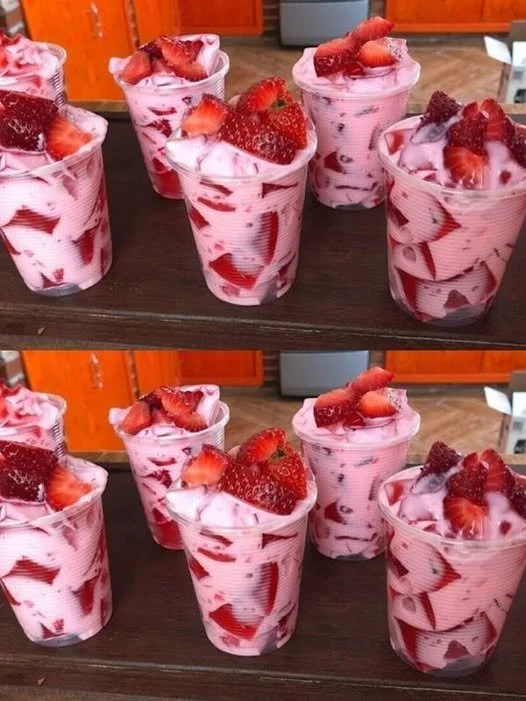 Delicious strawberry dessert featuring fresh strawberries and whipped cream.