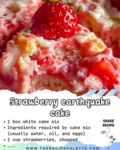 A mouthwatering Strawberry Earthquake Cake topped with fresh strawberries and whipped cream.