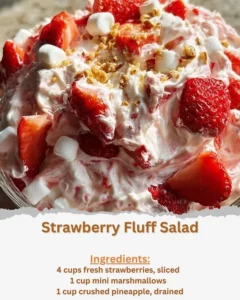 Colorful Strawberry Fluff Salad with strawberries and whipped cream in a bowl