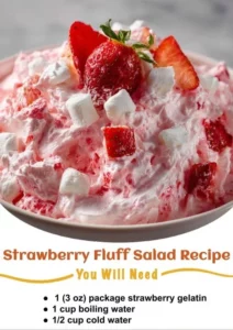 Delicious Strawberry Fluff Salad served in a bowl with fresh strawberries and whipped cream.