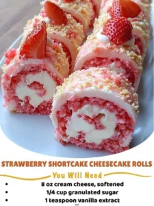 Strawberry Shortcake Cheesecake Rolls with fresh strawberries and whipped cream