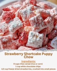 Delicious Strawberry Shortcake Puppy Chow sprinkled with powdered sugar