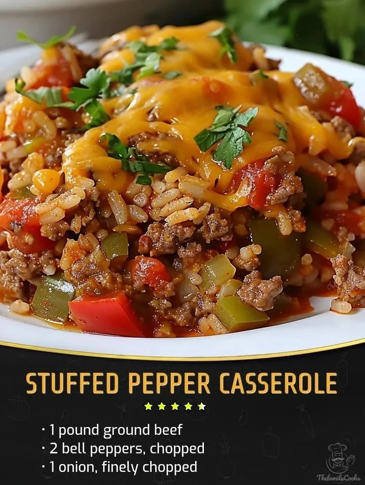 Delicious stuffed pepper casserole topped with cheese and fresh herbs