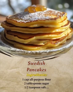 Delicious homemade Swedish Pancakes served with syrup and berries