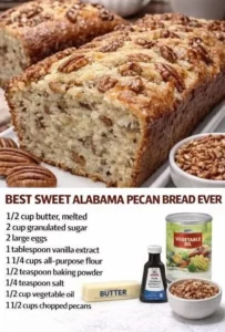 Loaf of Sweet Alabama Pecan Bread with pecans on a wooden table