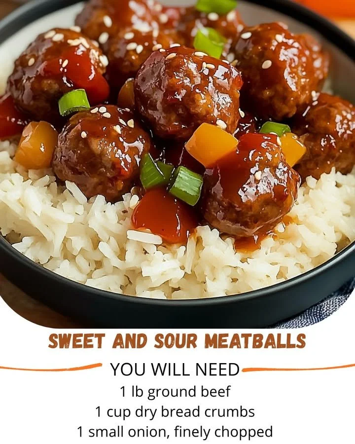 Plate of sweet and sour meatballs garnished with herbs