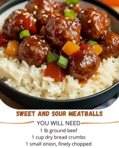 Delicious sweet and sour meatballs served on a plate with sauce and garnishes.