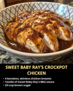 Delicious Sweet Baby Ray's Crockpot Chicken prepared in a slow cooker