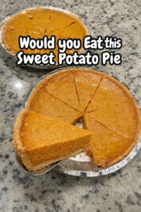 Delicious sweet potato pie topped with whipped cream on a rustic table