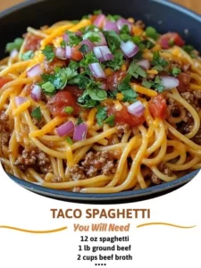 A delicious plate of Taco Spaghetti topped with cheese and herbs