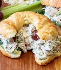 Delicious homemade chicken salad served in a bowl with fresh ingredients.