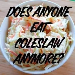 Bowl of KFC coleslaw with fresh vegetables and creamy dressing