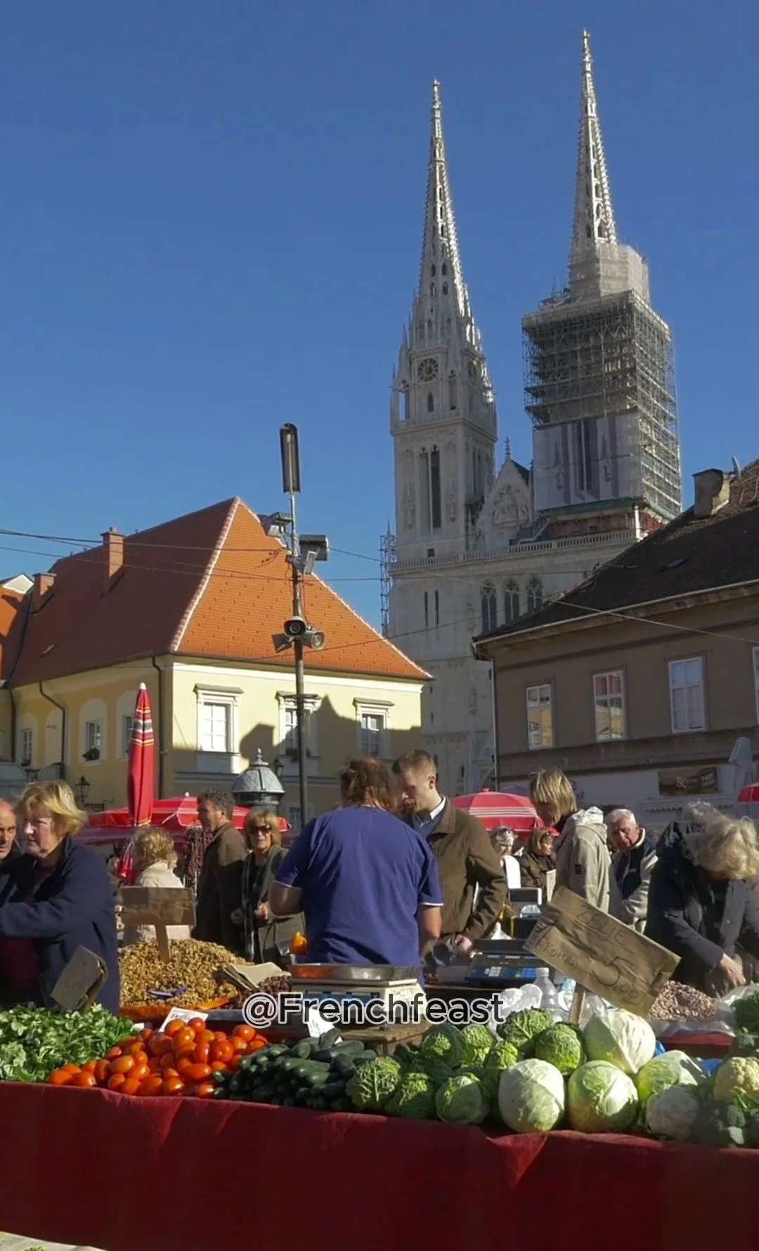 Vibrant stalls at the French Market showcasing fresh produce and local crafts.