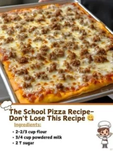 Delicious homemade school pizza recipe with fresh toppings on a golden crust.