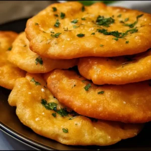 Traditional Indian fry bread served with toppings and garnishes