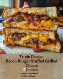 Delicious Triple Cheese Bacon Burger stuffed in a grilled cheese sandwich