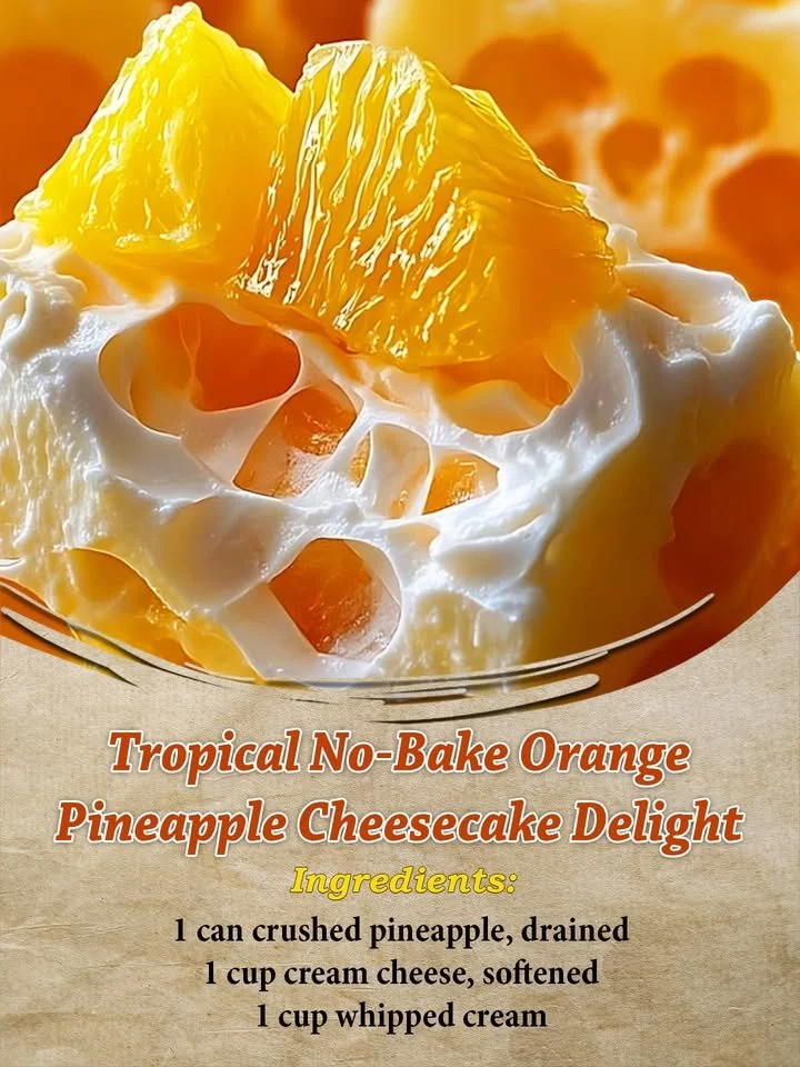 Tropical no-bake orange pineapple cheesecake dessert garnished with fresh fruit