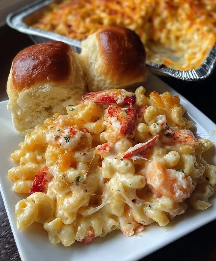 Delicious Lobster Shrimp Mac and Cheese served in a creamy sauce with seafood