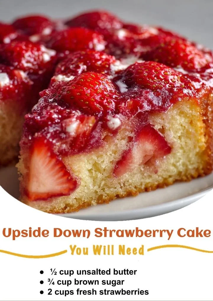 Upside down strawberry cake topped with fresh strawberries and caramel glaze