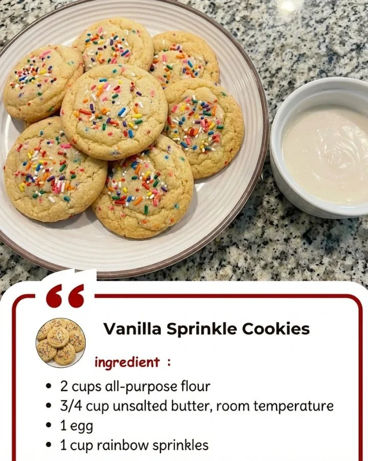 Freshly baked Vanilla Sprinkle Cookies decorated with colorful sprinkles