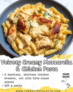 Creamy mozzarella chicken pasta topped with fresh herbs and cheese