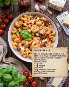 Creamy baked Boursin pasta with herbs and cheese in a dish