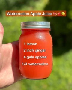 Glass of refreshing watermelon apple juice with fresh fruits