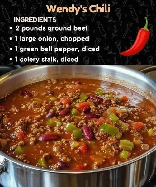 A bowl of Wendy's Chili topped with cheese and onions