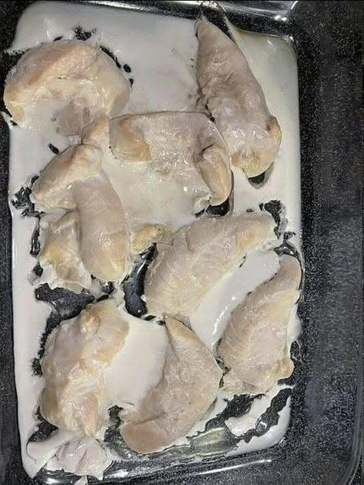 White rubbery substance from baked chicken revealing cooking mystery.