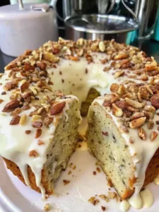 Delicious homemade white cake with whipped cream frosting and fresh berries