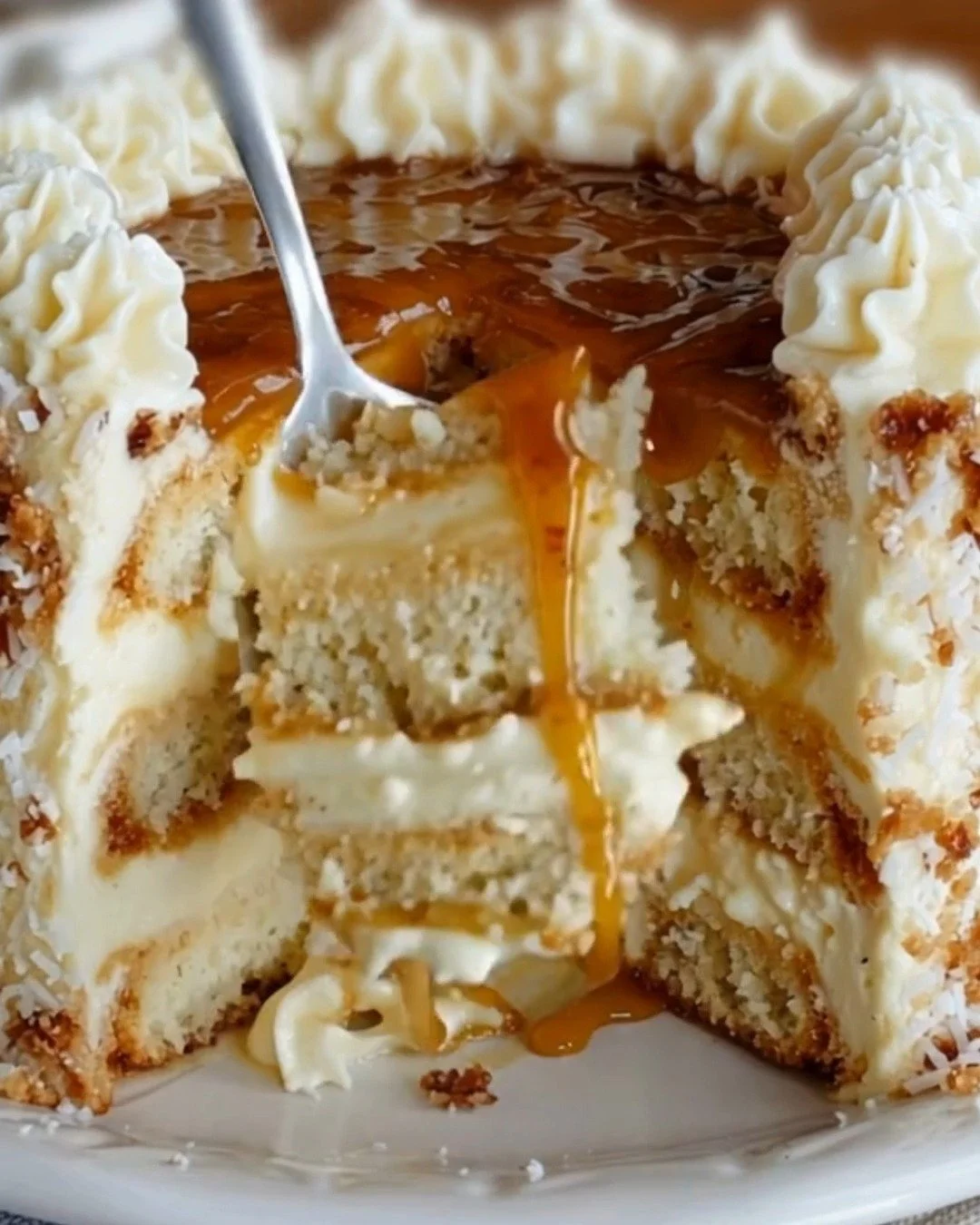 White German chocolate cake with a creamy cheesecake center and chocolate drizzle.