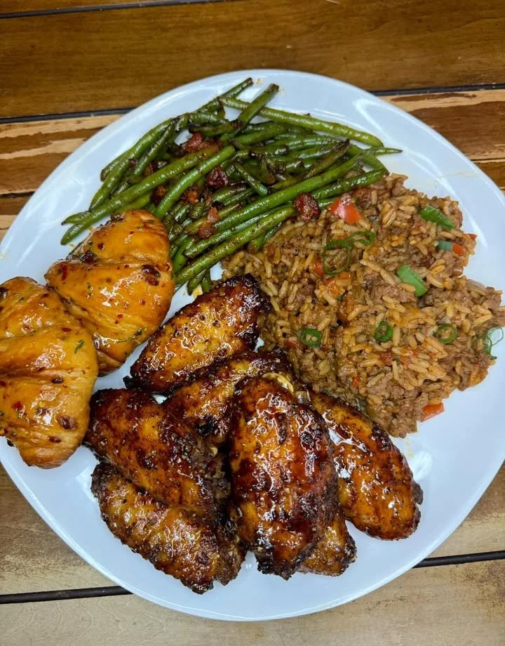 Flavorful wings served with dirty rice in a delicious dish.