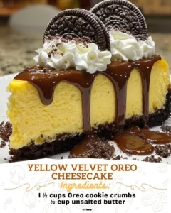 Delicious Yellow Velvet Oreo Cheesecake topped with Oreo crumbs and cream