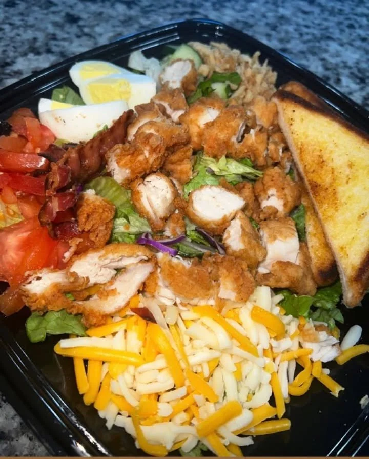 Fresh and flavorful Zaxby's Salads served with a variety of toppings