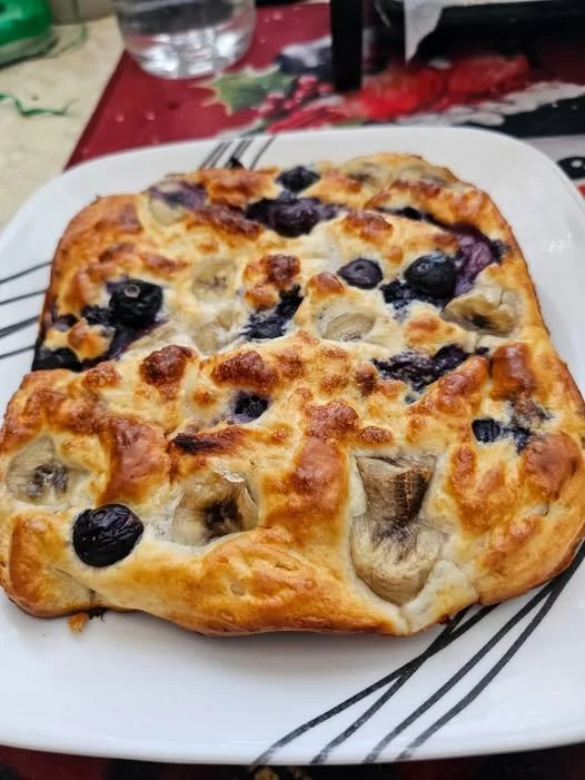 Delicious banana blueberry baked pancake fresh out of the oven