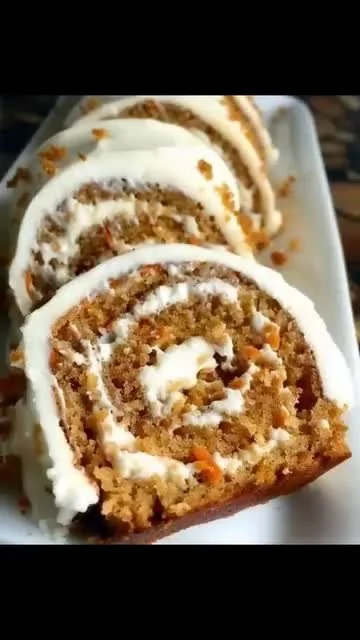 Delicious homemade carrot cake roll with cream cheese frosting