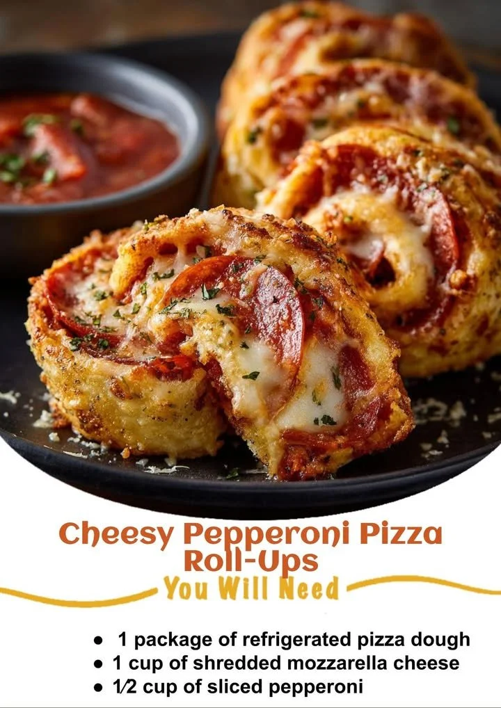 Cheesy pepperoni pizza roll-ups served on a plate with dipping sauce.