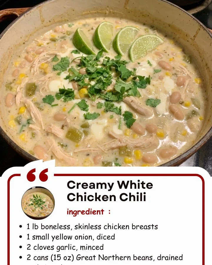 Bowl of creamy white chicken chili garnished with cilantro and lime