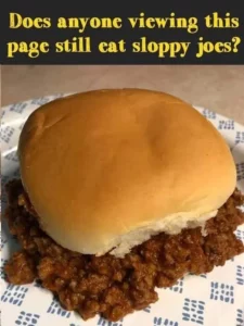Delicious homemade sloppy joes served on a bun with toppings.