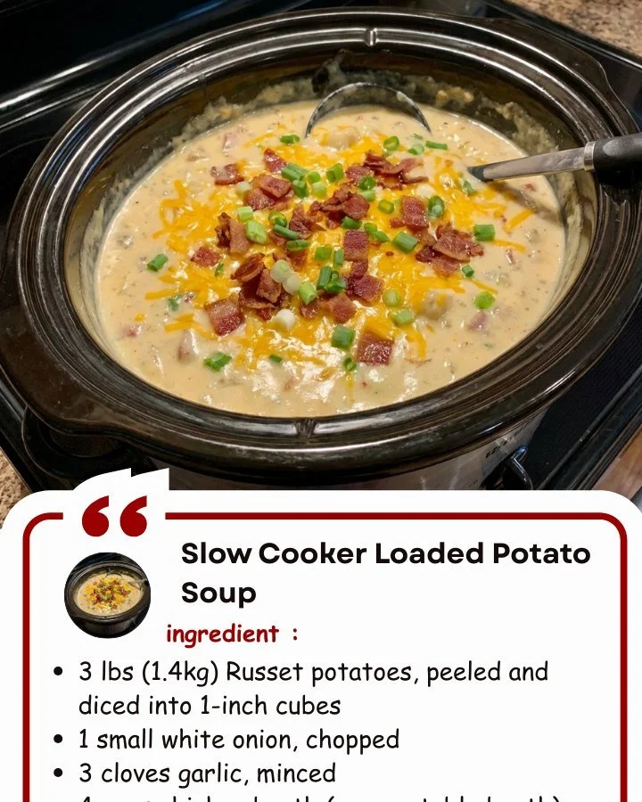 Bowl of Slow Cooker Loaded Potato Soup topped with cheese, bacon, and green onions