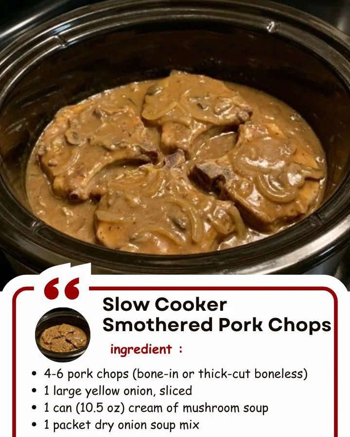 Slow cooker smothered pork chops served with gravy and vegetables