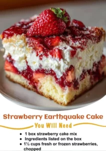 A slice of Strawberry Earthquake Cake topped with fresh strawberries and cream.